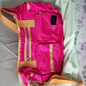 Handbag with adjustable strap